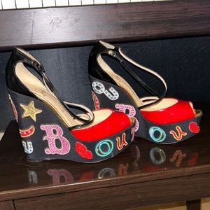 LEATHER SANDALS
Christian Louboutin